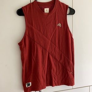 Tracksmith red tank top